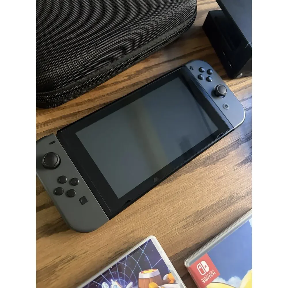 Nintendo Switch Console Gray Bundle with Games Kirby Pikachu Crash and Case